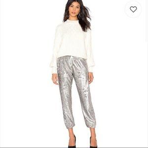 Silver sequin joggers.